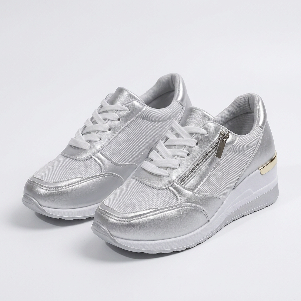 Ortopediska damsneakers med snörning och sidodragkedja.