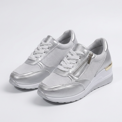 Ortopediska damsneakers med snörning och sidodragkedja.